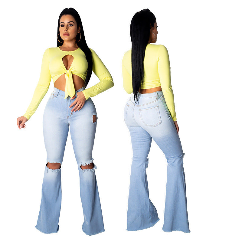 Flared Distressed Denim Jeans