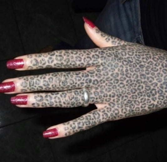 Cheetah Hand Tattoo